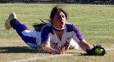 Lemoore's McKenzie Dutra makes a diving catch to rob Hanford of runs in the fifth inning of Tuesday's softball game.